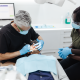 Dr George Lathouras performing a dental fillings service